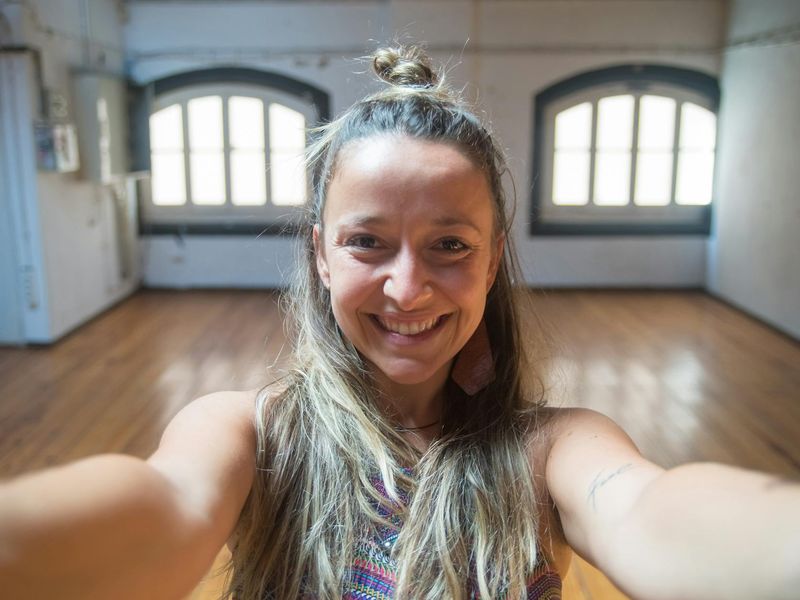 Wide view of a modern minimalist fitness studio space.